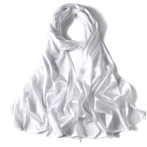 Close-up of white satin silk scarf showcasing its soft texture and elegant lustrous drape