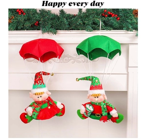 Hanging Christmas parachute elf ornaments in red and green colors for tree decoration
