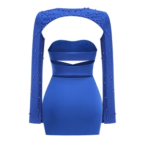 Detail of royal blue bodycon dress featuring open back and beaded long sleeve bolero shrug