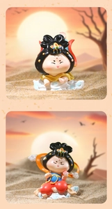 Close-up of Dunhuang style figurines with cloud bases in a desert sunset setting