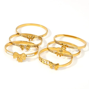 18K gold plated bow jewelry set with zircon accents and minimalist heart details