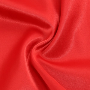 Elegant red satin bodycon dress featuring a deep V-neck and luxurious silk-like texture