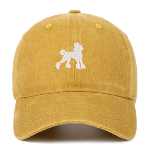 Mustard yellow washed cotton baseball cap featuring white poodle dog embroidery on front