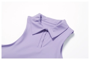 Close-up of the lavender sleeveless polo shirt showing collar detail and fabric texture