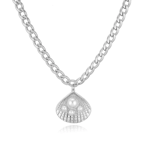 Macro shot of silver shell pendant with pearls on chunky link chain necklace