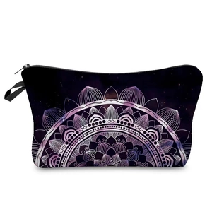 Detail of mandala pattern on makeup bag with zipper closure and starry sky design