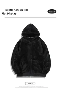 Detail of black hooded jacket featuring thick textured fleece and smooth zipper closure