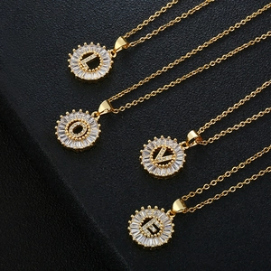 Gold-plated copper necklace with LOVE letter pendants and cubic zirconia stones