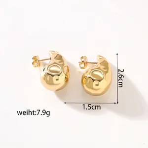 Detailed view of 18k gold plated hollow bean earrings with 2.6cm height measurement