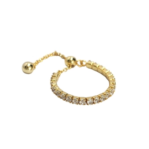 Adjustable S925 silver ring in gold with sparkling zircons and drawstring chain design