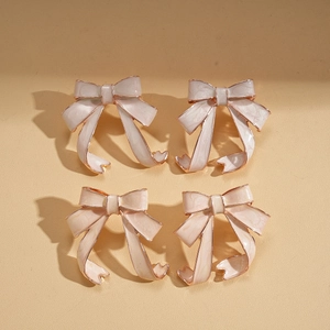 Retro bow-knot stud earrings in pastel peach and beige enamel finish, set of 4 pairs