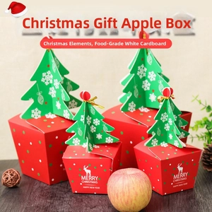 Detail of Christmas candy box with tree lid, red and green paper packaging for gifts
