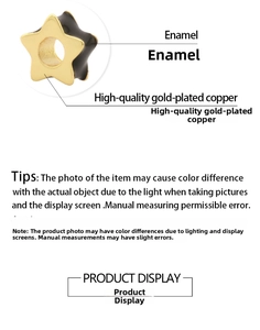 Macro shot of gold-plated copper star bead with black enamel finish for DIY jewelry