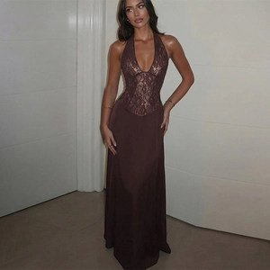 Detail of elegant chocolate brown halter dress with lace bodice and satin skirt