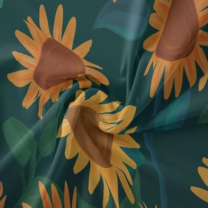 Close-up of bohemian sunflower tapestry showing detailed yellow petals on deep green fabric