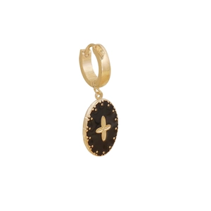 Macro detail of gold hoop earring featuring a black enamel oval drop with star motif