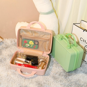 Mini 14-inch hardshell vanity cases in pink and green with organized interior storage