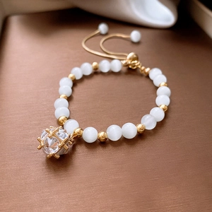 Adjustable faux strawberry crystal and pearl heart bracelet with gold zircon charm