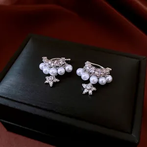 Double-layer zircon pearl ear clip featuring a sparkling star pendant and silver finish
