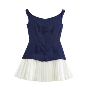Robe sans manches bleu marine élégante avec jupe plissée blanche et fermeture éclair
