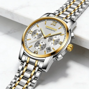 Close-up of a two-tone stainless steel men's watch with luminous gold hands and date window.