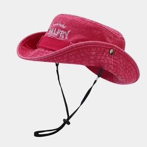 Close-up of rose red outdoor hat with white BELFRY embroidery and black chin strap