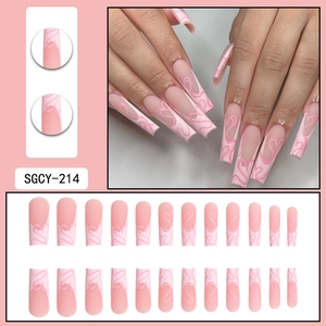 Long pink press-on nails with heart patterns and wavy lines, full set of 24 pieces