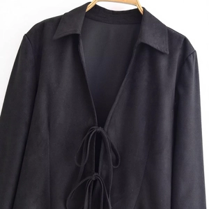 Women black long sleeve shirt featuring elegant bow ties and a slim fit design