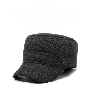 Detailed view of winter military cap fabric texture and leather side emblem