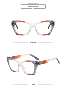 Detail view of cat eye sunglasses in gray orange gradient frame showing side and front profiles