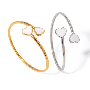 Polished 18k gold and silver stainless steel open bangles with white heart enamel detail