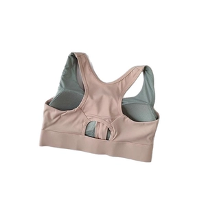 Dusty rose high-impact sports bra with racerback cutout and breathable grey mesh lining