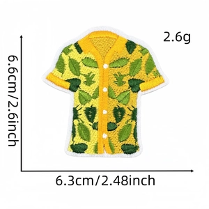 Detail of tropical shirt embroidered patch with green leaf pattern and size dimensions