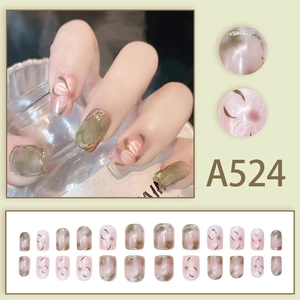 Short round-square press-on nails set with pink floral art and green cat-eye finish