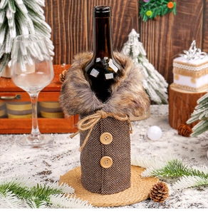 Detail of Christmas wine bottle cover with faux fur collar and herringbone fabric textures