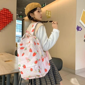 Pink student backpack with cute strawberry and flower print for teenage girls