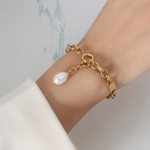 French vintage 18k gold plated chain bracelet with natural freshwater pearl on wrist