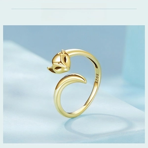Macro shot of S925 sterling silver fox ring showing clear hallmark and golden plating
