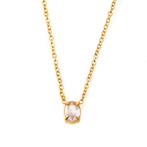 Minimalist gold plated titanium necklace with oval cubic zirconia pendant on white background