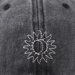 Charcoal grey washed cotton baseball cap with embroidered sun and moon design