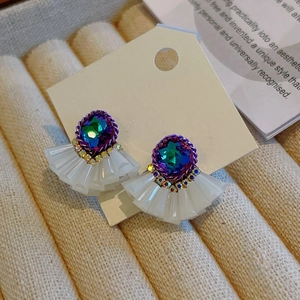 Elegant silver needle earrings with purple gradient crystal and white fan-shaped skirt design