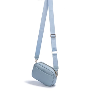 Light blue cross-body camera bag with litchi texture and adjustable wide fabric strap