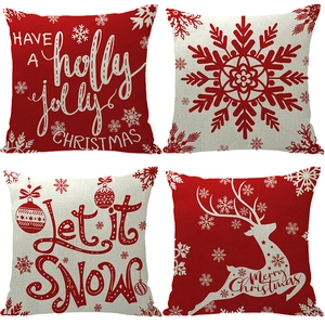 Set of four Christmas linen pillow covers with reindeer and snowflake prints