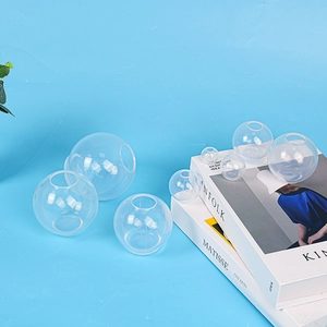 Macro shot of multiple transparent resin ball molds in various sizes for DIY crafts
