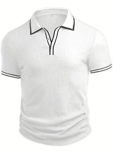 Close-up of white polo shirt with knit rib texture and black contrast striped collar