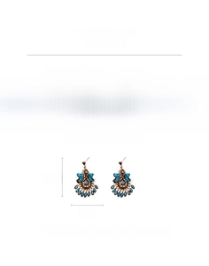Detail view of Bohemian vintage drop earrings with blue cubic zirconia weighing 9.9g