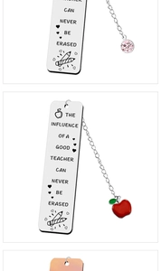 Close-up of engraved stainless steel bookmarks with apple and pink round pendants
