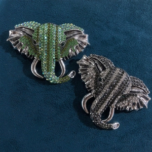 Vintage elephant head brooches with green and black rhinestones for suits