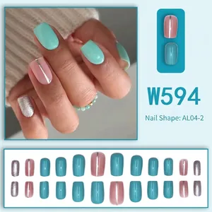 Short square reusable press-on nails in mint green and pink with silver glitter accents