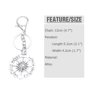 Detailed view of silver alloy compass keychain with dimension markings and starburst design